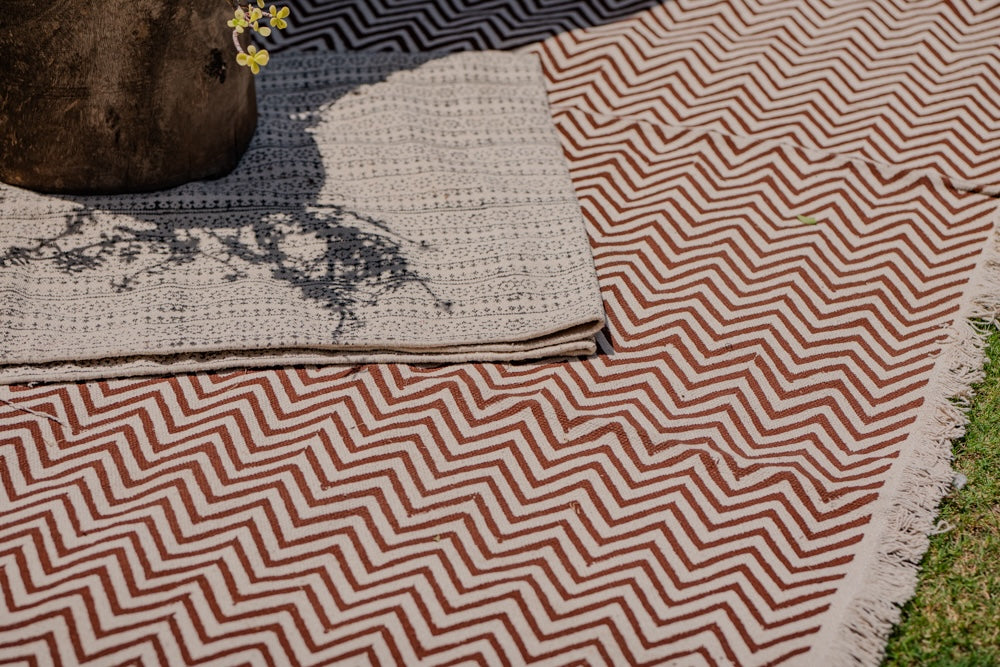Ekaurr Zig Zag Block Print Rug handcrafted flat weave rug with hand-stamped zigzag geometric block print pattern, artisan Indian textile for living rooms and entryways