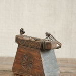 Teliya in Natural Finish vintage Indian oil lamp carrier repurposed as a sculptural home decor accent with natural earthy wood and metal finish, heritage found object for shelves and curated interiors